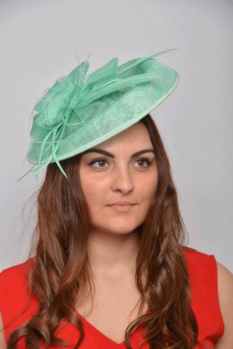 Headdress Greta. Sinamay and Feathers in Apple Green